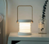 Portable collapsible lantern