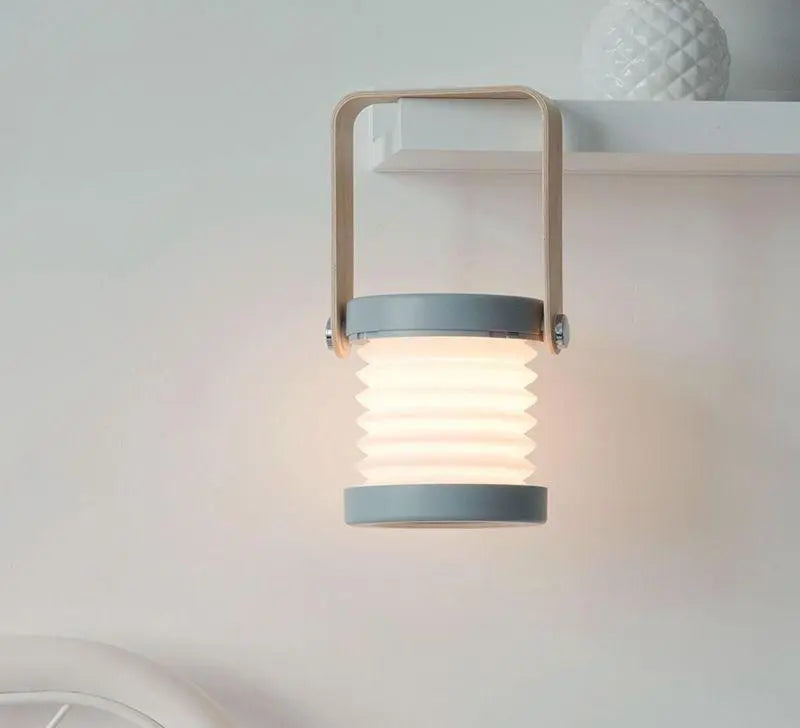 Portable collapsible lantern