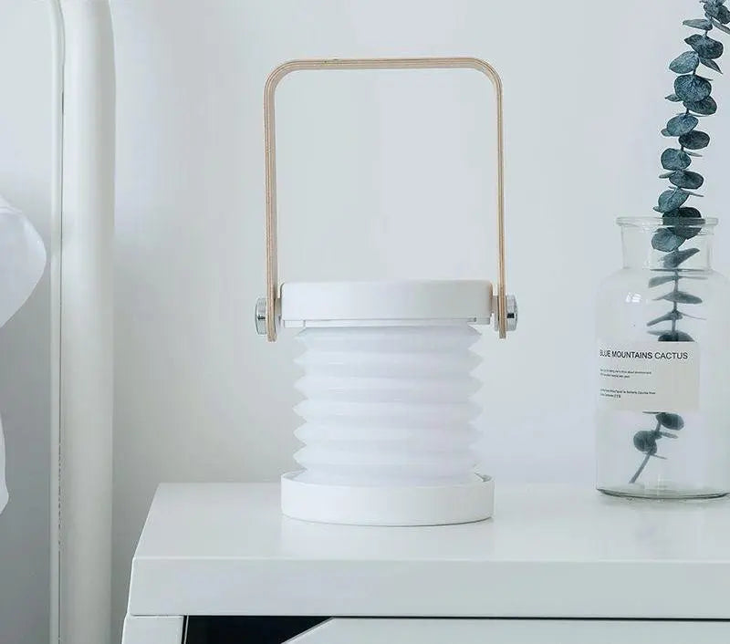 Portable collapsible lantern